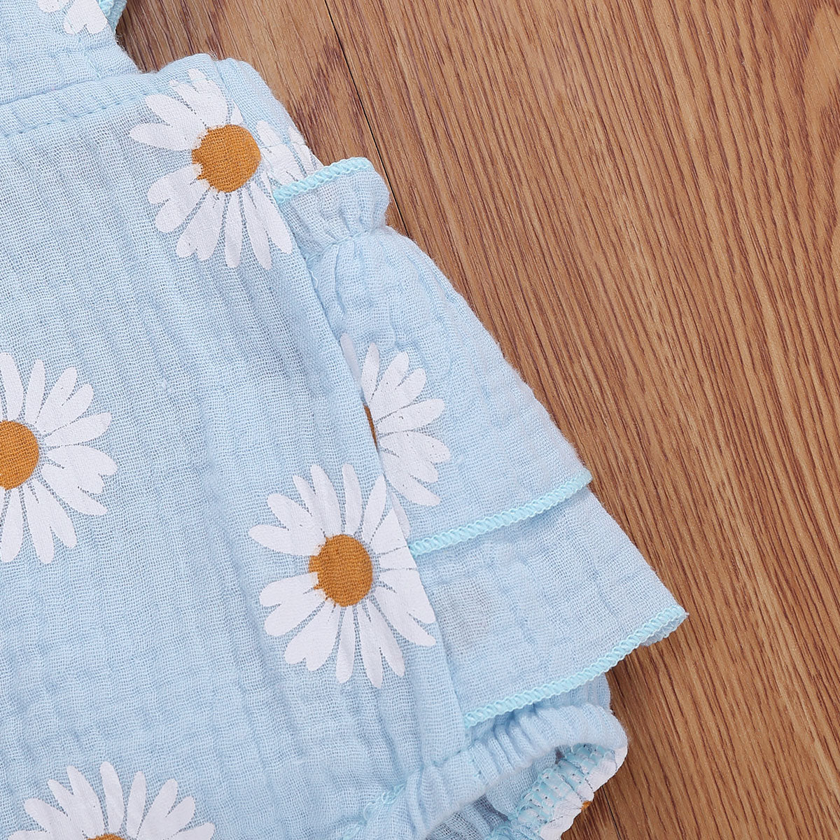 Barboteuse florale bébé – Confort et style pour nouveau-né
