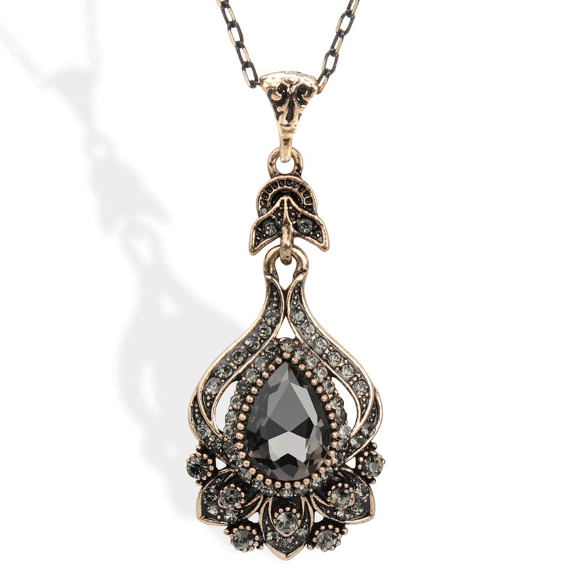 Boucles d'oreilles pendantes cristal gris Kinel – Bijou vintage doré