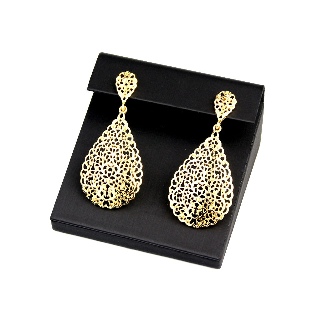 Boucles d'Oreilles Pendantes Métal Doré Sunspicems - Bijou Africain