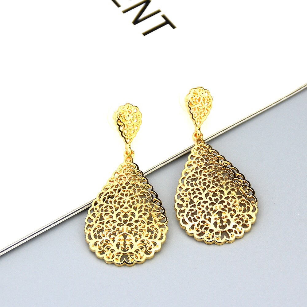Boucles d'Oreilles Pendantes Métal Doré Sunspicems - Bijou Africain